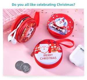 Detail view of round Christmas tin storage pouches with zippers for coins and earphones