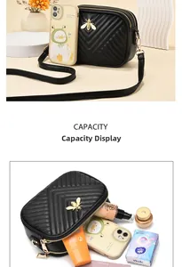 Detail of black quilted PU leather crossbody bag showing spacious double zipper capacity