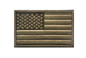 Detail of embroidered American flag tactical patch in military green and khaki