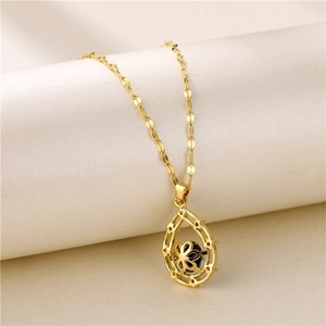 Collier goutte d'eau changeant de couleur en acier titane doré avec pendentif zircon