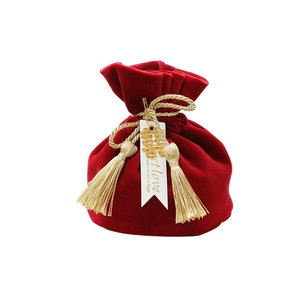 European velvet drawstring wedding favor bag with gold tassels and Double Happiness charm