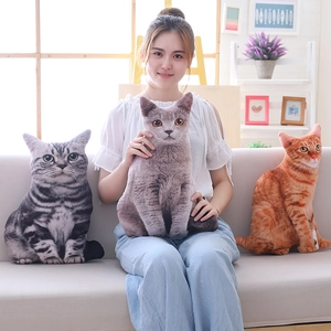 Lifelike 3D plush cat pillows in grey tabby, solid grey and orange tabby designs