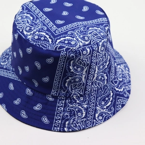 Detail view of dark blue paisley bucket hat showing fabric texture and sewing craft
