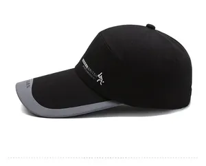 Side view of black baseball cap featuring white athletic print and grey visor trim