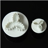 Detail of two white plastic plum blossom cookie cutters in large and small sizes