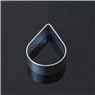 Detail of silver drop-shaped metal mold for baking or leather cutting on black background
