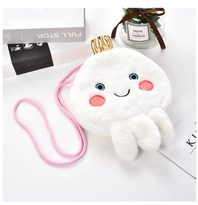 Detail of white jellyfish plush crossbody bag with gold crown and pink strap