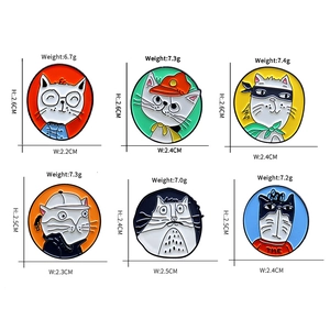 Detailed view of colorful cartoon cat enamel pins with dimensions and weight specs