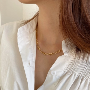 Minimalist 925 sterling silver golden circle chain necklace for women on white shirt