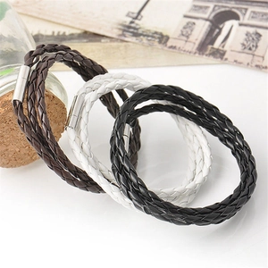 Three-piece multi-layer braided leather bracelets in black, brown, and white with magnetic clasps