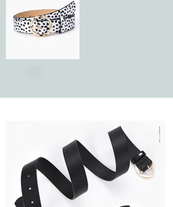 Detail of wide waist belts with gold round buckles in polka dot and black faux leather
