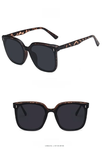 Detail view of leopard print square sunglasses with dark grey lenses in front and side views