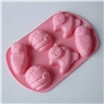 Pink silicone mold with 6 cavities shaped like game characters for chocolate and cake