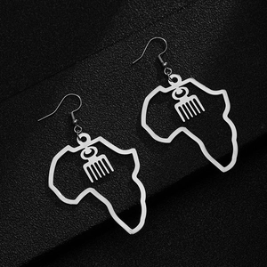 Detailed silver African map earrings with intricate Afro comb cutout design on black