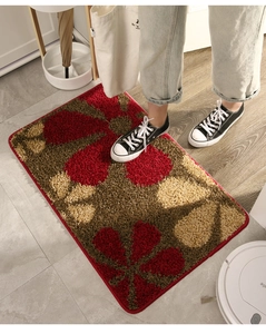 Close-up of floral patterned entrance mat showing durable texture and non-slip surface