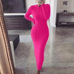 Fuchsia cable knit long sleeve maxi dress featuring a slim fit and round neckline style