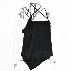 Macro detail of black satin halter top with tie-back and irregular hemline design