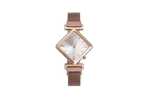 Detailed macro view of the rose gold diamond-shaped watch face and mesh Milanese strap