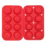 Close-up of red silicone sphere mold with two pieces for DIY baking and chocolate making
