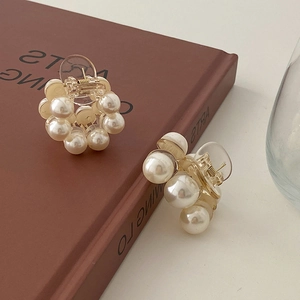 Elegant mini pearl hair claws with transparent acrylic and gold metal springs
