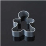 Close-up of a stainless steel gingerbread man cookie cutter for festive baking