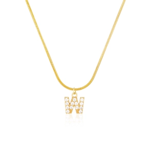 Detail of gold snake chain necklace featuring a crystal-encrusted letter W pendant