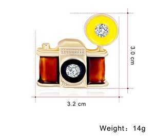 Detailed view of vintage camera brooch dimensions 3.2cm x 3.0cm with enamel and rhinestones