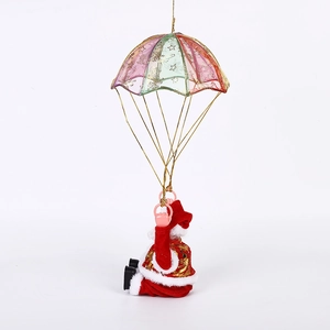 Detail of Santa Claus in red gold robes with star pattern colorful parachute ornament