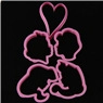 Detailed view of five pink plastic heart-shaped cookie cutters with character silhouettes