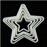 Detailed set of five white star-shaped cookie cutters in various sizes on a black background
