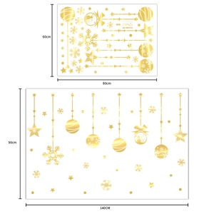 Autocollants de Noël dorés avec flocons de neige et boîtes cadeaux pour décor de fenêtre