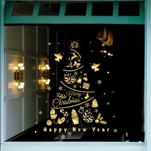 Detailed golden Christmas tree static window decal with Merry Christmas text on glass