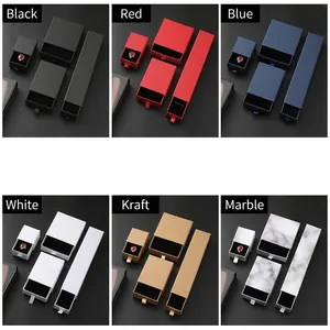 Drawer style jewelry gift boxes in various colors including black, blue, and marble patterns