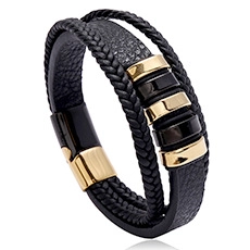 Close-up of multilayer leather bracelet with black braided ropes and gold magnetic clasp