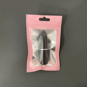 Lipstick in clear matte pouch with pink borders and top hang hole for retail display