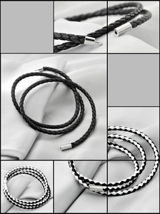 Close-up of woven leather multilayer bracelets with silver magnetic cylinder clasps