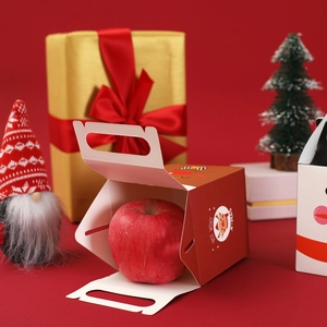 Christmas apple gift box featuring red cartoon reindeer design and festive paper handle