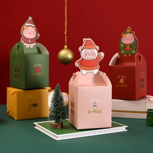 Christmas gift boxes with cartoon cat toppers and Merry Christmas greetings in multiple colors