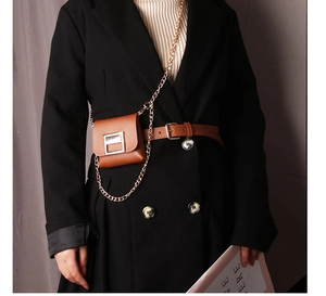 Close-up of brown leather mini belt bag with gold chain and square buckle detail