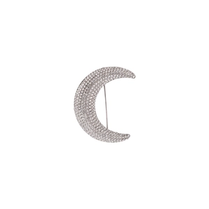 Sparkling silver crescent moon brooch with pavé rhinestones for women on white background