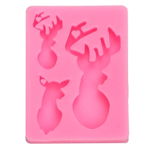 Pink silicone mold with three reindeer shapes for chocolate fondant and DIY crafts