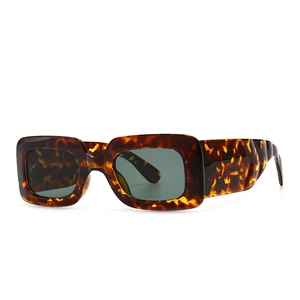 Modern retro rectangle tortoise shell sunglasses for women with wide temples and glossy finish