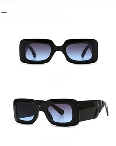 Detail of vintage square sunglasses with thick black frames and wave texture temples