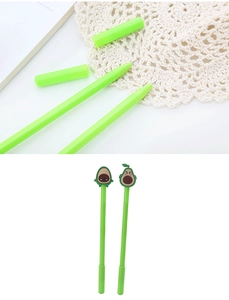 Close-up of cute avocado-shaped pens showing fine tips and detailed cartoon toppers