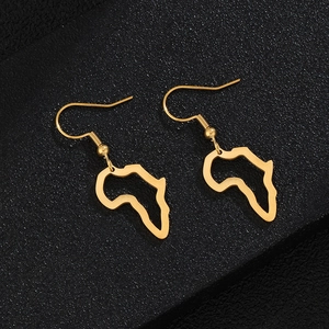 Polished gold-plated Africa map dangle earrings on a textured black background