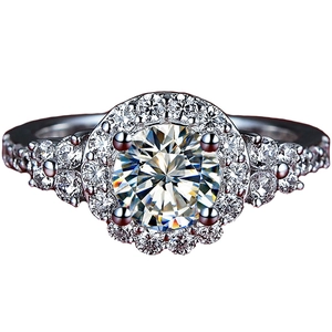 Macro shot of a luxury 2-carat round moissanite ring with a halo of side diamonds
