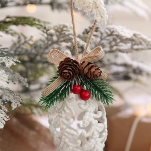 Christmas tree hanging ornament with white base, pine cones, red berries and jute rope