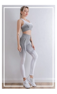 Detail of high-waist seamless leggings with side support textures and grey gradient