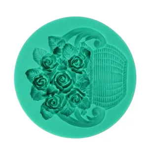Detail of round green silicone mold with intricate rose bouquet relief for DIY baking