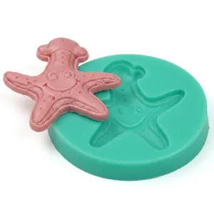 Detailed view of starfish silicone mold and a finished pink decorative starfish